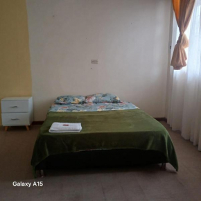 Casa grande cerca al centro